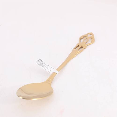 ملعقة عشاء مزخرفة ذهبية