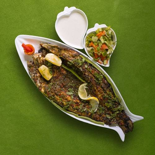 سيباس مشوي بصوص الزبدة والليمون