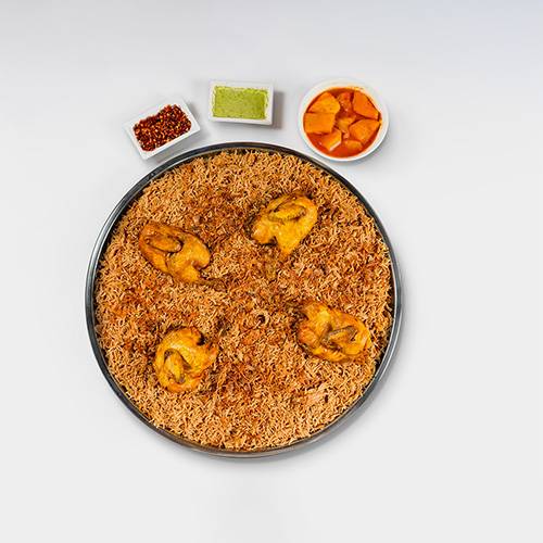 صينية مجبوس دجاج عيش بني