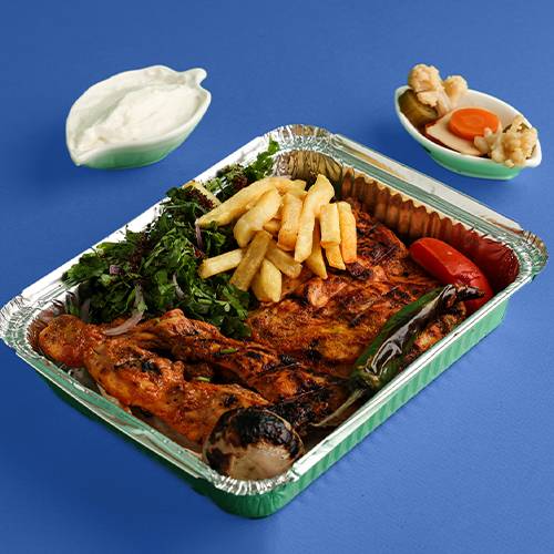 نصف دجاج على الفحم