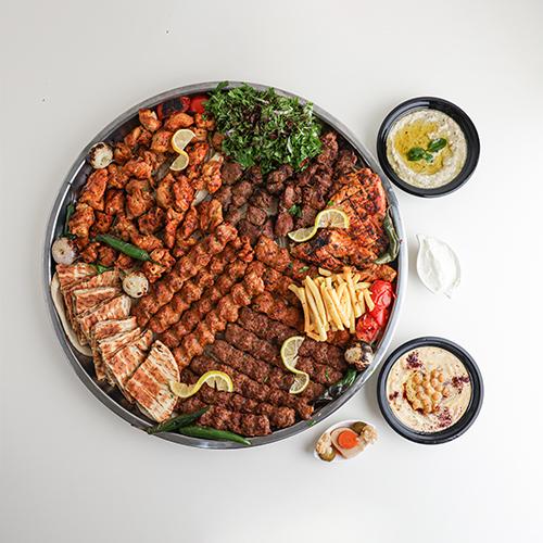 صينية مشويات مشكله تكفي من 5الى6 اشخاص